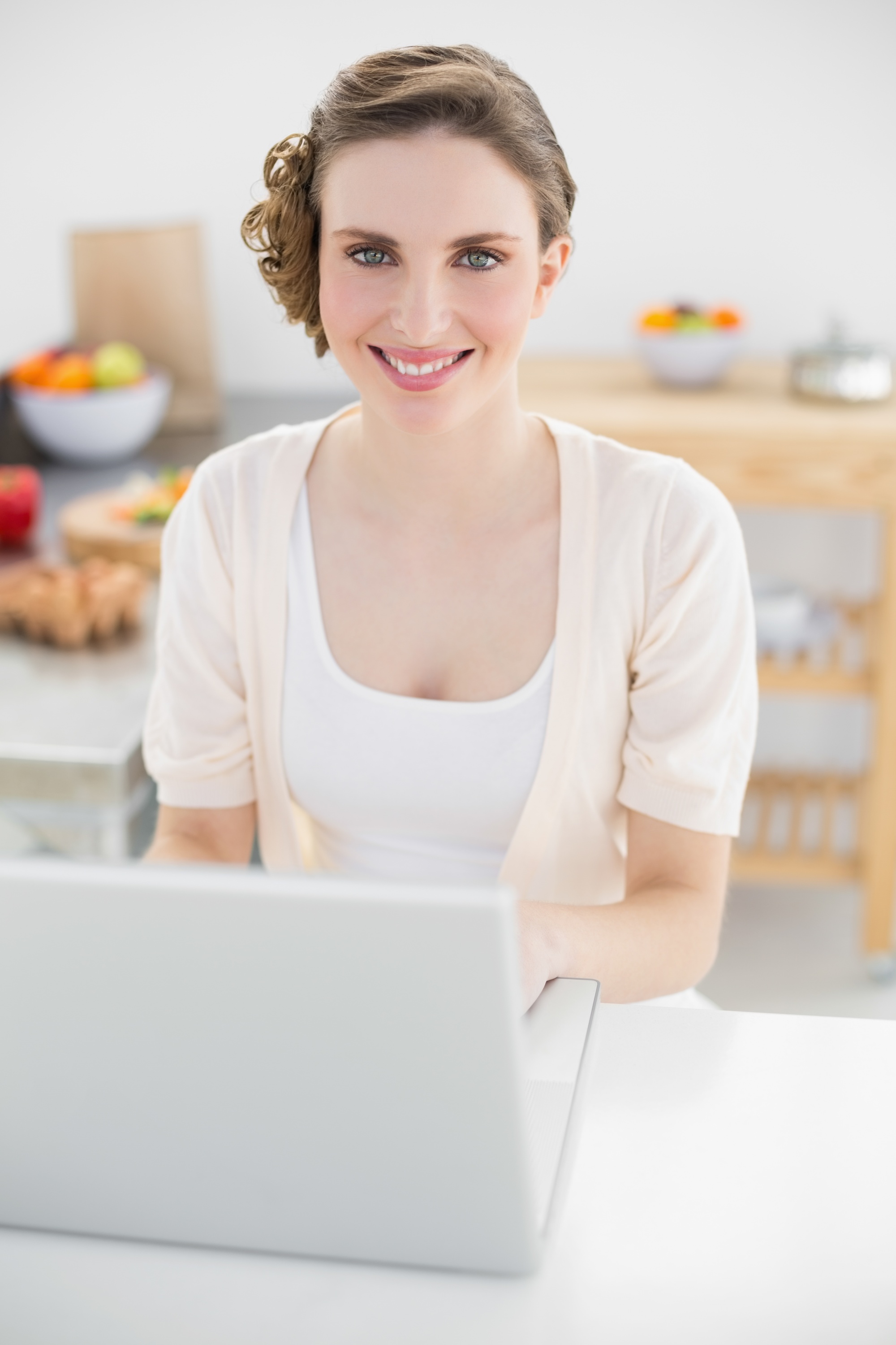 Instructor smiling in a home kitchen